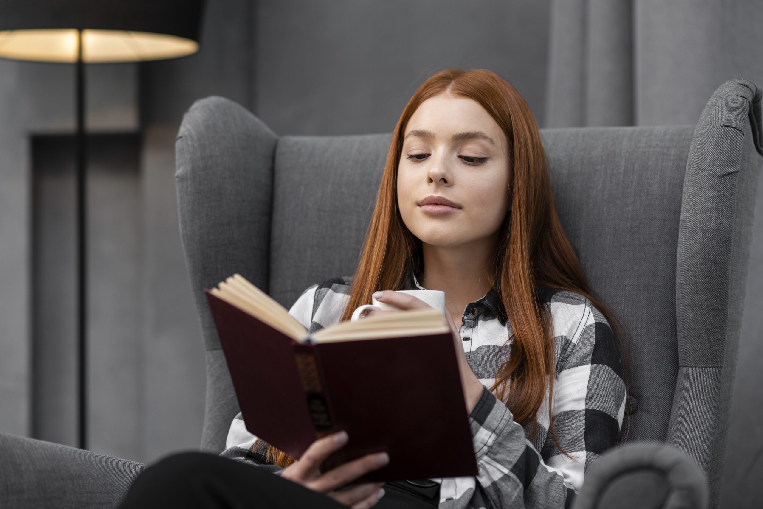 Showing Poor Posture When Reading a Book, Neck Bent Down