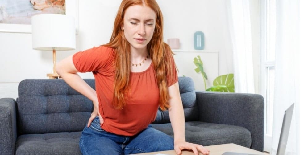 A woman with back pain
