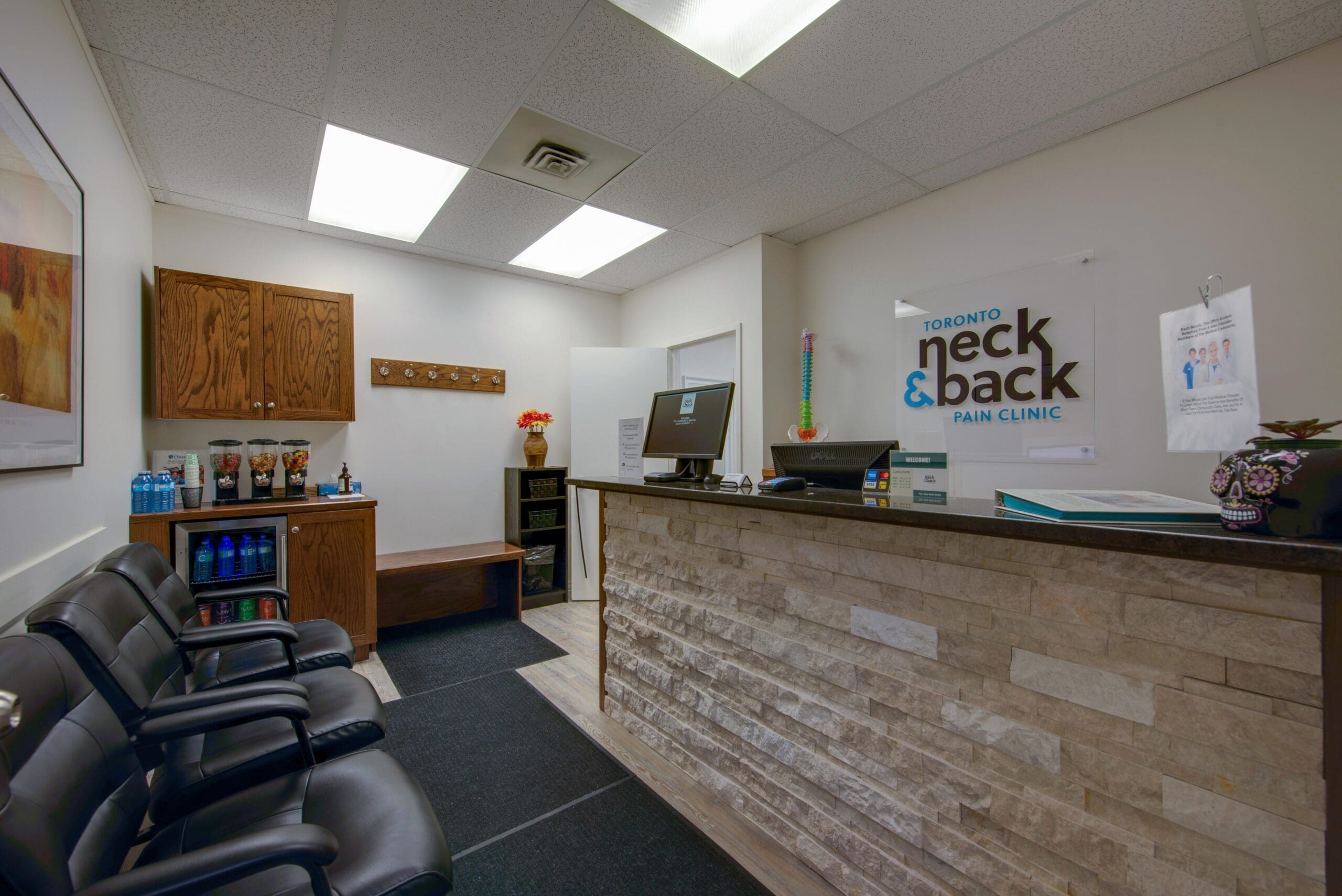 Modern reception area at Toronto Neck and Back Pain Clinic with a welcoming, professional atmosphere